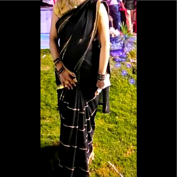 Sleek chic party wear black saree with golden lace on all sides - Picture 8 of 8